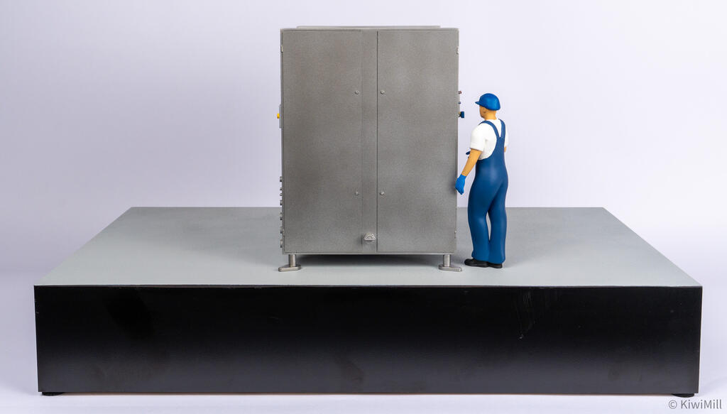 Straight end view of the chiller model's double doors with the to-scale operator figure standing at the right corner